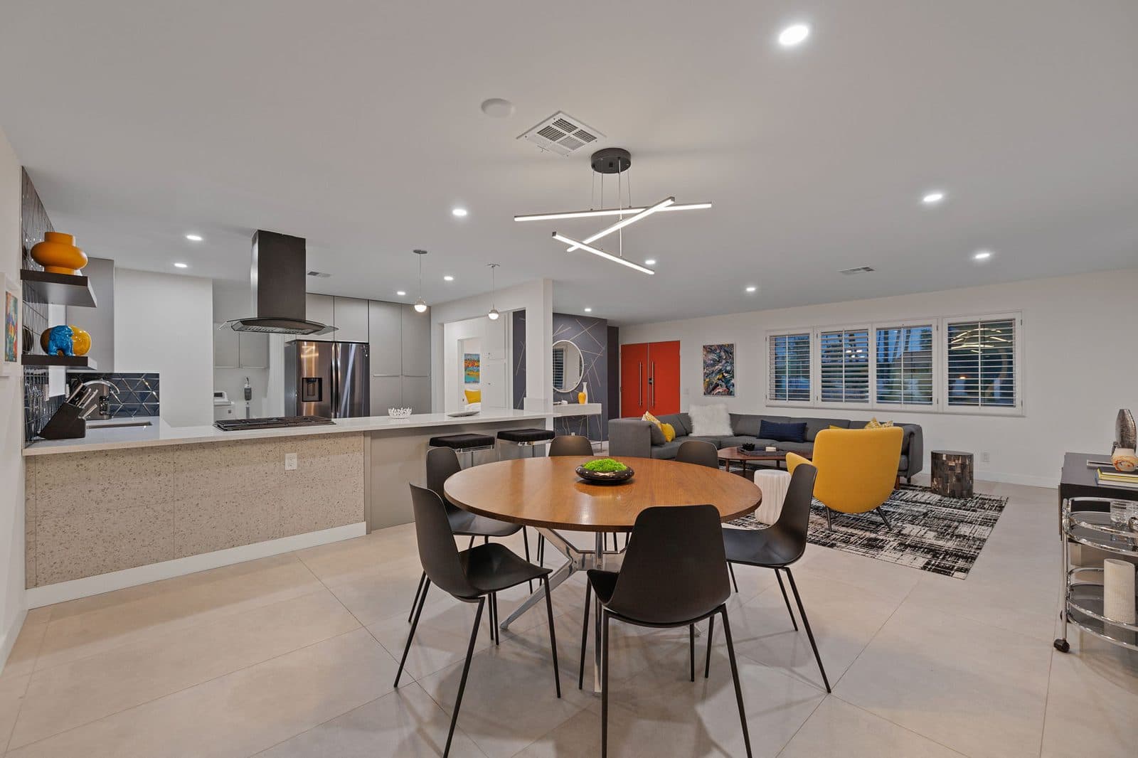 Dining area with round walnut table