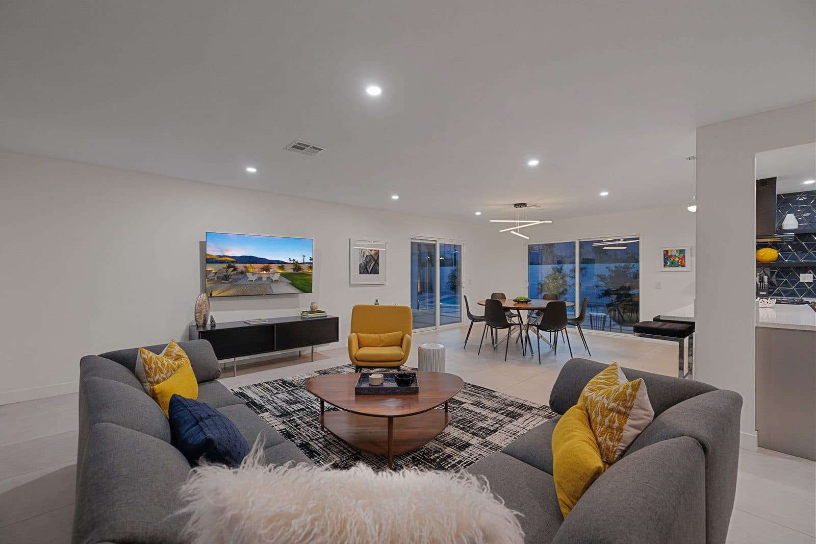 Living room detail with mustard accent chairs